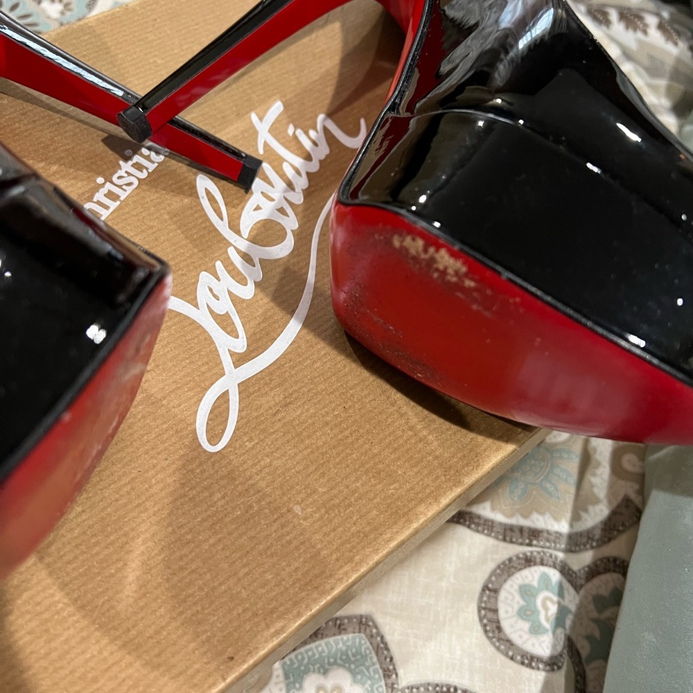Louboutin heels .. worn once
